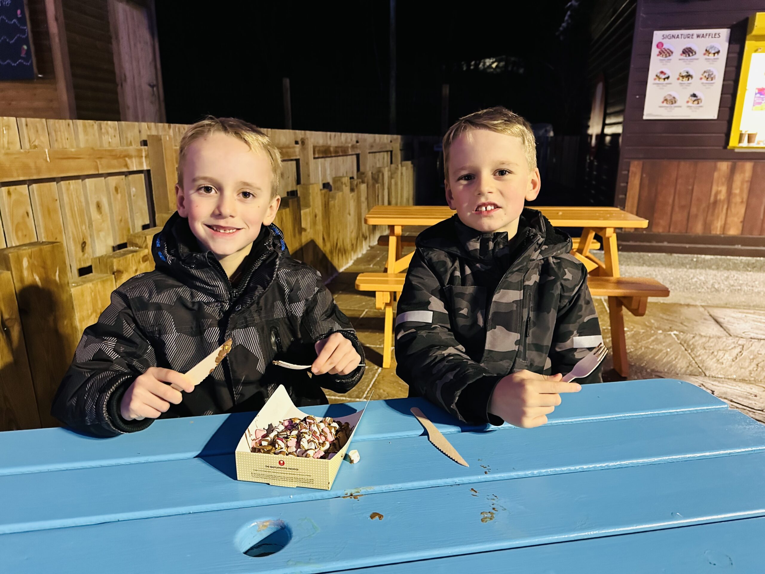 Twin brothers having a waffle at Bluestone